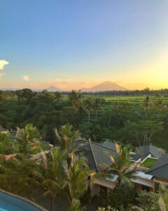 Enjoying sunset view from private villa balcony