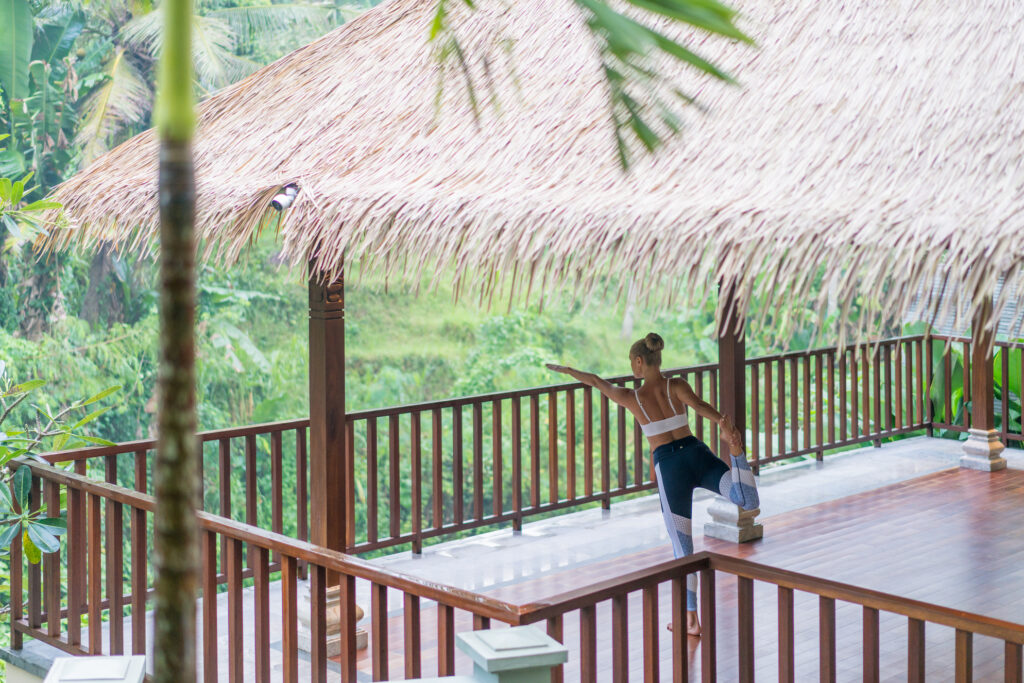 Morning yoga in riverside pavilion