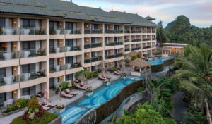 Infinity pool overlooking rice fields at SereS Springs Resort & Spa