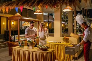 Private chef preparing organic Indonesian cuisine in luxury setting